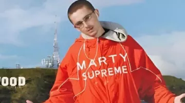 Orange Jacket worn by Marty (Timothée Chalamet) as seen in Marty Supreme