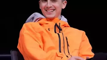 Marty Supreme 2025 Timothée Chalamet Orange Tracksuit worn by Marty (Timothée Chalamet) in Marty Supreme