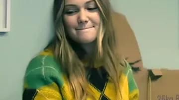 Jingle Bell Heist 2025 Olivia Holt Argyle Sweater worn by Sophia (Olivia Holt) as seen in Jingle Bell Heist