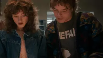 The Fall Bend Sinister Domstay Pay Off 1986 T-Shirt worn by Jonathan Byers (Charlie Heaton) in Stranger Things (S05E01)