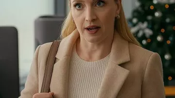 Christmas Above The Clouds 2025 Emily Tennant Beige Coat