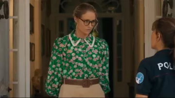 Me+Em Green Floral Blouse worn by Iris Nixon (Niamh Algar) as seen in The Iris Affair (S01E01)