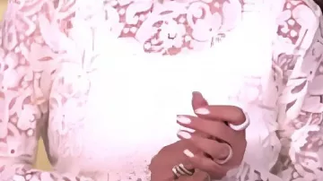 Lace Turtleneck Top worn by Self - Co-Host (Sunny Hostin) in The View