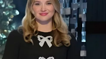 Black Embellished Bow Dress worn by Self - Judge (Melissa Peterman) as seen in Finding Mr. Christmas (S02E05)