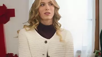 Christmas on Every Page 2025 Rose Reid White Cardigan worn by (Rose Reid) as seen in Christmas on Every Page