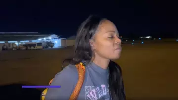 Mud & Moo Boutique Wild West Graphic Tee worn by Sparkle Clark as seen in Tiffany Haddish Goes Off (S01E05)