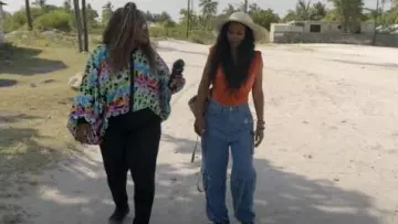 The Woman Concept Multi Pocket Straight Denim Jeans worn by Sparkle Clark as seen in Tiffany Haddish Goes Off (S01E06)