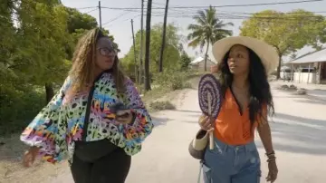 Vera Wang Straw Woven Shoulder Tote Bag worn by Sparkle Clark as seen in Tiffany Haddish Goes Off (S01E06)