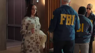 Cult Gaia Nala Pleated Leather Clutch worn by Molly Novak (Maya Rudolph) as seen in Loot (S03E09)