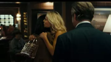 Christian Louboutin Paloma Loubinthesky Spiked Metallic Crossbody Tote Bag worn by Angela Norris (Ali Larter) as seen in Landman (S02E03)