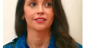 Oh What Fun 2025 Felicity Jones Blue Jacket worn by Channing (Felicity Jones) in Oh. What. Fun.