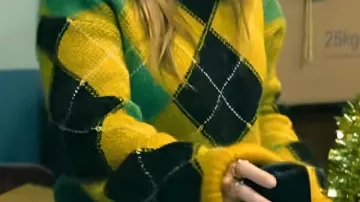 Yellow Fuzzy Sweater worn by Sophia (Olivia Holt) in Jingle Bell Heist