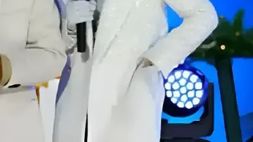 White Coat worn by Savannah Guthrie in Hoda Kotb and Savannah Guthrie share emotional moment at last Rockefeller tree lighting ceremony