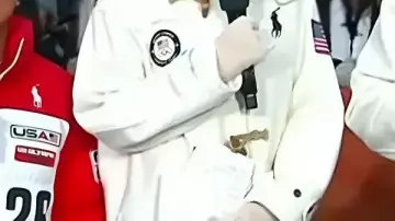 E White Toggle Coat worn by Savannah Guthrie in Savannah Guthrie Gets Emotional On Her 10th Anniversary With TODAY