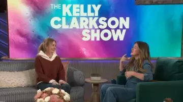 Tory Burch Contrast Collar Wool Sweater worn by Justine Lupe as seen in The Kelly Clarkson Show on December 3, 2025