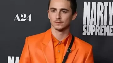 Timothée Chalamet Marty Supreme LA Premiere Orange Suit worn by Marty (Timothée Chalamet) as seen in Marty Supreme