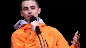 Marty Supreme Timothée Chalamet Orange Tracksuit of Marty (Timothée Chalamet) in Marty Supreme