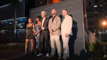 Jimmy Choo Black Cut Out Patent Leather Sandals worn by Jess Taylor as seen in Owning Manhattan (S02E07)