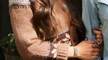 Brown Cardigan worn by Joanna Gaines in Fixer Upper: The Lakehouse - Official Trailer | Magnolia Network