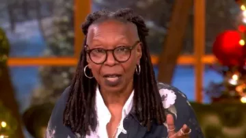 R13 Black Shredded Seam Drop Neck Shirt worn by Whoopi Goldberg as seen in The View on December 9, 2025