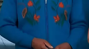 Blue Floral Zip Cardigan worn by Scott Evans in Theresa Caputo Connects 'Access Daily' Host Scott Evans w/ Friend Who Died