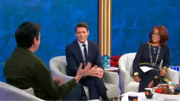 Karen Millen Handkerchief-hem Rib-knit Dress worn by Gayle King as seen in CBS Mornings on December 1, 2025