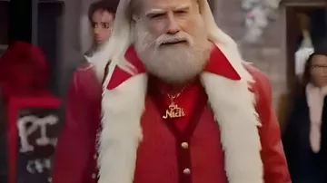 John Travolta Capital One: Chaqueta de anuncios navideños en Capital One | Anuncio de Quicksilver "Fiebre de la Noche de las Fiestas" (2023) con John Travolta