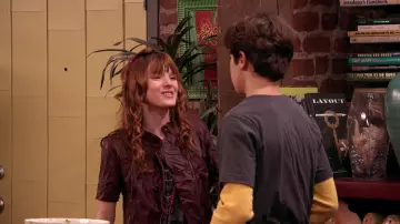 Reading the Tarot Book of Max Russo (Jake T. Austin) in Wizards of Waverly Place (S03E20)