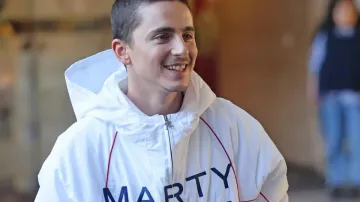 Timothee Chalamet White Marty Supreme Hoodie of Marty (Timothée Chalamet) in Marty Supreme