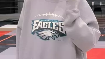 The End of an Era Taylor Swift Eagles Sweatshirt worn by Taylor Swift in Taylor Swift in TEARS: Most Emotional Moments From The End of an Era