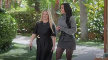 Gianni Versace Embossed Black Leather Tie Front Grey Wool Mini Skirt worn by Kim Kardashian as seen in The Kardashians (S07E08)