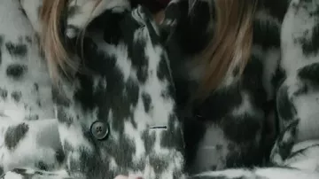 Cowhide Printed Coat worn by (Alina Rose Armstrong) in Elsbeth