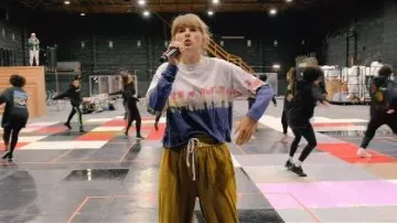 Daydreamer Rainbow Wash Tee worn by Taylor Swift as seen in Taylor Swift | The Eras Tour | The End of an Era (S01E01)