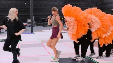 New Balance 1906R Ganni Egret worn by Taylor Swift as seen in Taylor Swift | The Eras Tour | The End of an Era (S01E02)