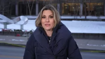 Mackage Adali Hooded Water Repellent Down Jacket worn by Erin McLaughlin as seen in Today on December 15, 2025