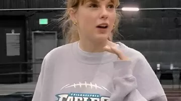 The End of an Era Taylor Swift Eagles Sweatshirt worn by Self (Taylor Swift) as seen in Taylor Swift | The Eras Tour | The End of an Era (S01E06)