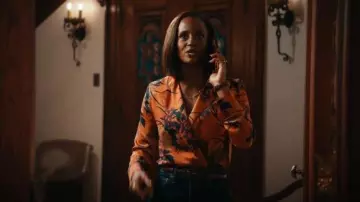 Zara Orange Floral Print Faux Wrap Bodysuit worn by Olympia Lawrence (Skye P. Marshall) as seen in Matlock (S02E07)