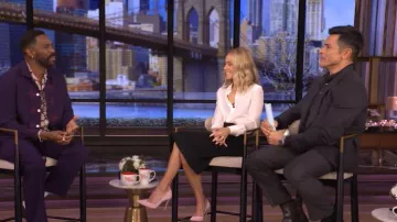 Saint Laurent Lavallière-neck Blouse worn by Kelly Ripa as seen in LIVE with Kelly and Mark on December 15, 2025