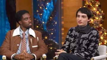 John Varvatos Venosa Houndstooth Jacket worn by Finn Wolfhard as seen in Good Morning America on December 16, 2025