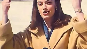Ella McCay Emma Mackey Brown Wrap Coat worn by Ella McCay (Emma Mackey) as seen in Ella McCay