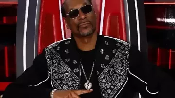 The Voice S28 Finale Snoop Dogg Black Jacket worn by Snoop Dogg as seen in The Voice