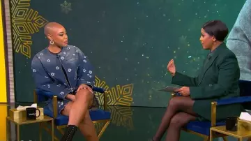 Marc Jacobs Daisy Sequined Denim Crop Jacket worn by Christine Williamson as seen in Tamron Hall Show on December 16, 2025