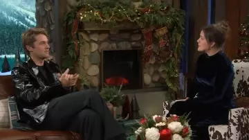 Rabanne Asymmetric Ruched Embellished Velvet Turtleneck Dress worn by Kelly Clarkson as seen in The Kelly Clarkson Show on December 15, 2025