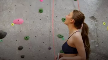 Alo Yoga Airlift Intrigue Bra Navy worn by Natalie Maguire as seen in Vanderpump Rules(S12E03)