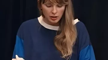 Taylor Swift The End of an Era Blue Sweatshirt worn by Self (Taylor Swift) as seen in Taylor Swift | The Eras Tour | The End of an Era (S01)