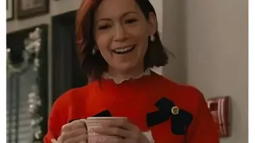 Elsbeth S03 Carrie Preston Bow Sweater worn by Elsbeth Tascioni (Carrie Preston) as seen in Elsbeth (S03)