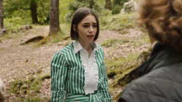 Sébline Ruffe Polo Shirt worn by Emily Cooper (Lily Collins) as seen in Emily in Paris (S05E01)