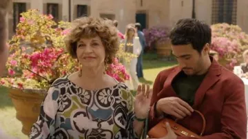 Lalage Beaumont Maya East West Caribou in Orange worn by Antonia Muratori (Anna Galiena) as seen in Emily in Paris (S05E01)