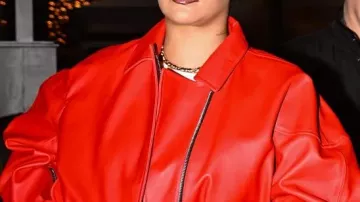 Rihanna Santa Red Leather Bomber Jacket worn by Rihanna in Rihanna Looks Stylish in Red Jacket While Shopping in Los Angeles