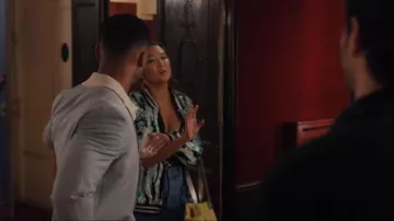 Vivienne Westwood Baby Printed Canvas Utility Small Bag worn by Mindy Chen (Ashley Park) as seen in Emily in Paris (S05E03)